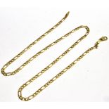 A 9CT GOLD CHAIN the Figaro link chain with lobster claw fastener 21 inches long, weighing approx.