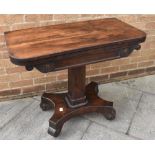 19TH CENTURY ROSEWOOD FOLDOVER CARD TABLE raised on a central square column, with a quadriform base,