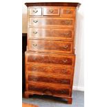 20TH CENTURY SECRETAIRE CHEST ON CHEST, the upper section with a moulded cornice above three short
