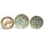 A CHINESE CANTON PLATE enamelled decoration of figures in a court setting within Famille Verte