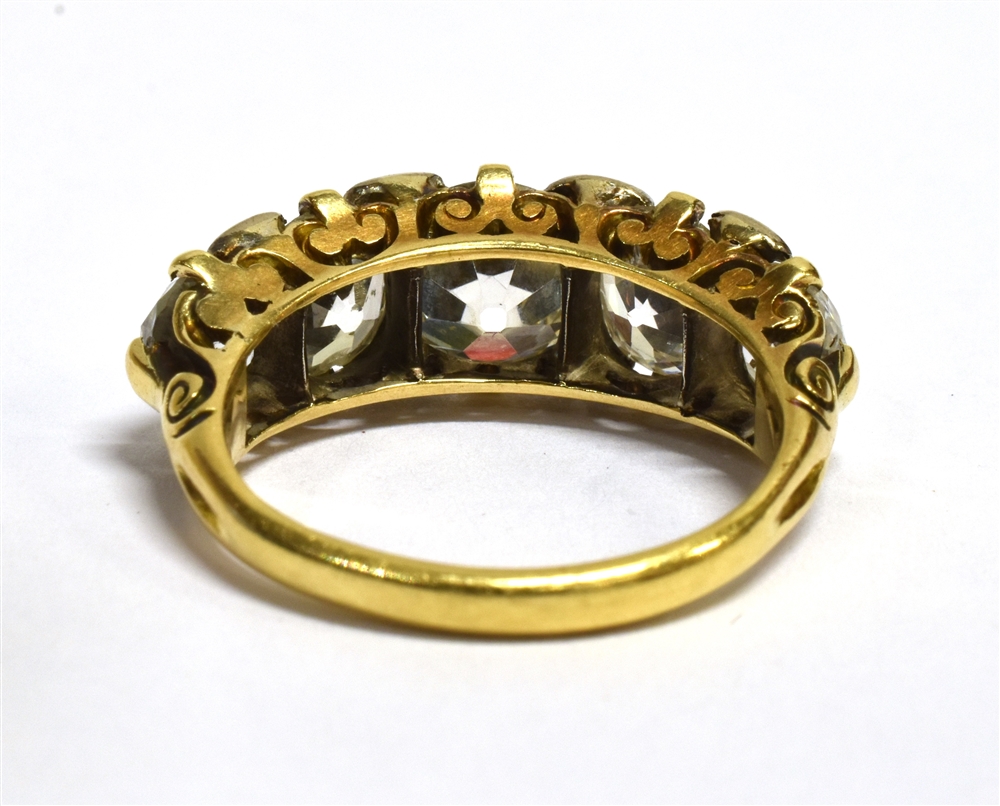 A 5 CARAT LATE VICTORIAN/EDWARDIAN FIVE STONE RING the round/off round old cut diamonds graduating - Image 4 of 4