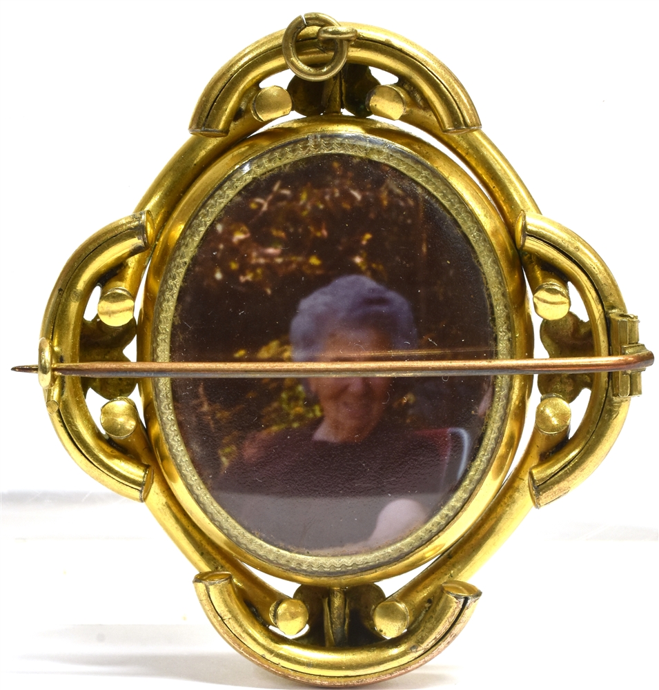 A VICTORIAN LARGE YELLOW METAL SWIVEL BROOCH the central oval swivel comprising a shell cameo - Image 2 of 2