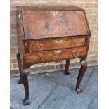 19TH CENTURY BURR WALNUT BUREAU, the fall front opening to reveal a central section of three