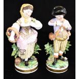 A PAIR OF STEVENSON & HANCOCK (DERBY) PORCELAIN FIGURES of a boy and girl, each holding a flower,