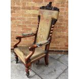 A VICTORIAN MAHOGANY WOOLWORK UPHOLSTERED ARMCHAIR with carved scrollwork cresting and spiral