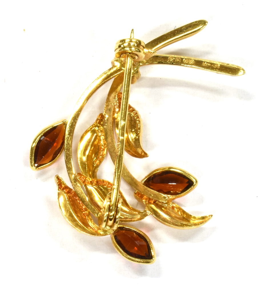 AN 18CT GOLD GARNET SET SPRAY BROOCH the spray of stylised design, set with three marquise cut - Image 2 of 2