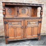 19TH CENTURY OAK COURT CUPBOARD, the upper section with carved floral decoration to the top, above a