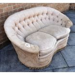 AN UPHOLSTERED BUTTON BACK SERPENTINE TWO-SEAT SOFA 77cm high, 157cm wide, 87cm deep.