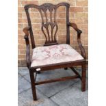 A CHIPPENDALE STYLE MAHOGANY ELBOW CHAIR 19th century, with a drop-in seat, the square supports