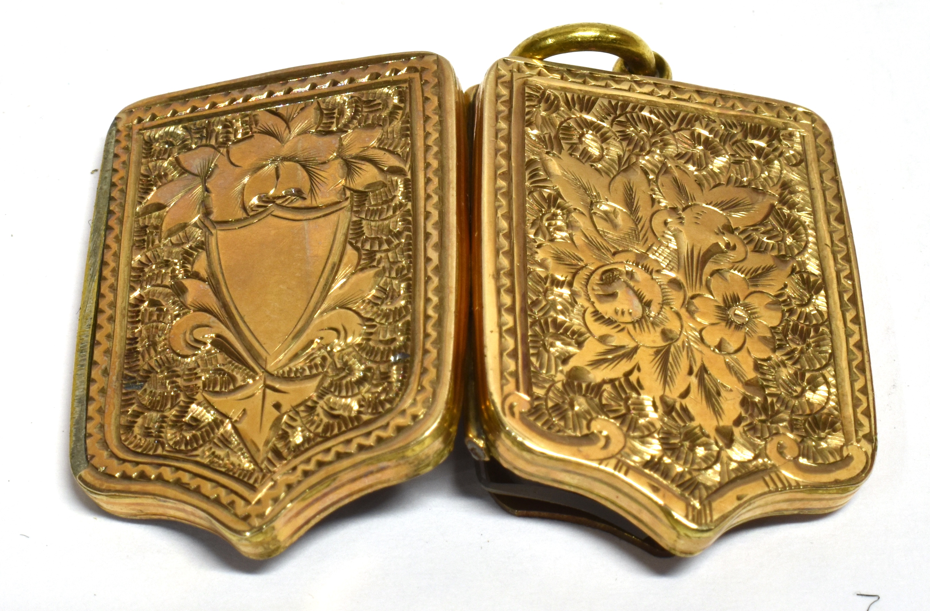 A VICTORIAN SHIELD SHAPED LOCKET Floral decoration with shield shaped cartouche unmarked assessed as - Image 3 of 3