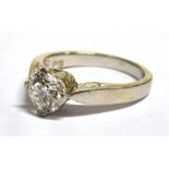 A 1 CARAT DIAMOND SOLITAIRE PLATINUM RING The round brilliant cut diamond weighing 1.01 carats,