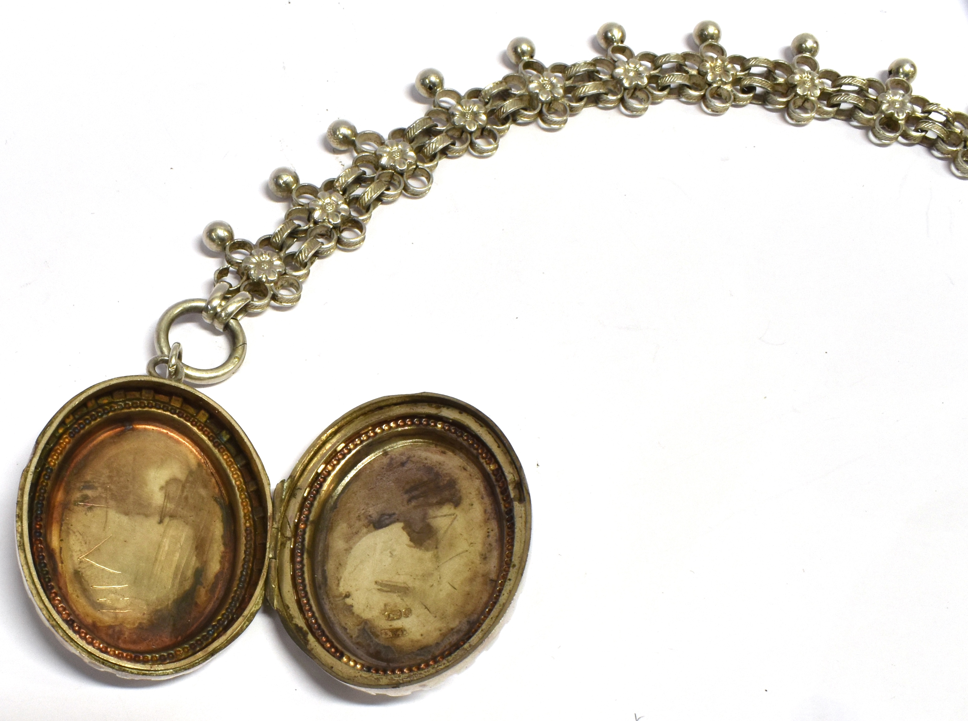A VICTORIAN SILVER LOCKET with inlaid yellow and rose gold floral decoration to front, 45mm long - Image 3 of 3