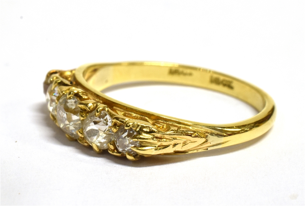 A DIAMOND FIVE STONE 18CT GOLD RING the boat shaped head claw set with five graduating round old cut