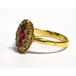 A VICTORIAN RUBY AND DIAMOND CLUSTER RING the marquise shaped cluster with three rubies to the