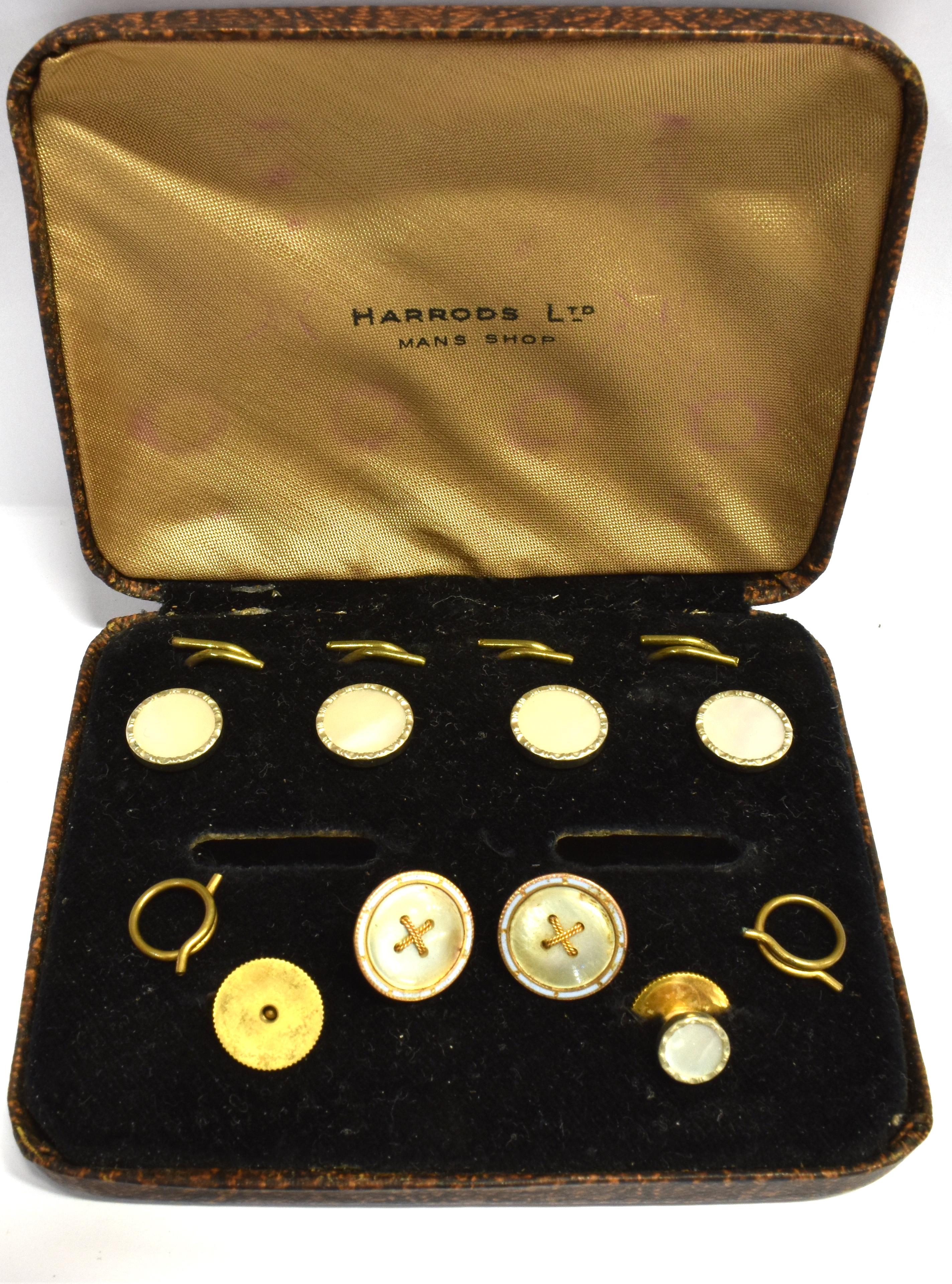 TWO 9CT GOLD AND MOTHER OF PEARL GENT'S DRESS STUDS Gross weight approx. 2.4 grams (not including