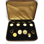 TWO 9CT GOLD AND MOTHER OF PEARL GENT'S DRESS STUDS Gross weight approx. 2.4 grams (not including