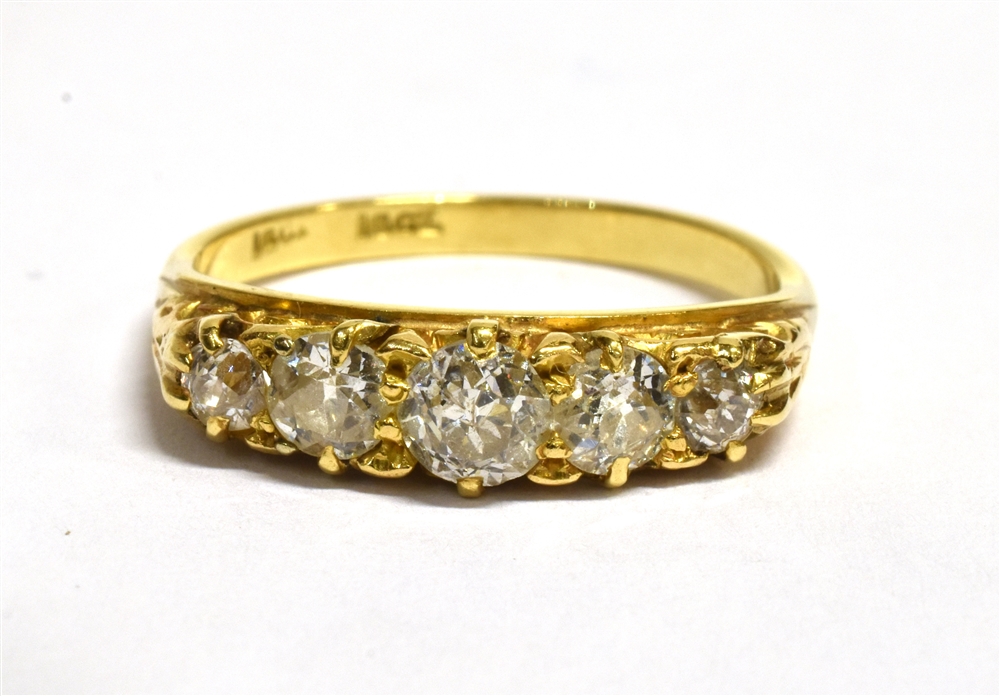 A DIAMOND FIVE STONE 18CT GOLD RING the boat shaped head claw set with five graduating round old cut - Image 2 of 3