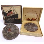 MILITARIA - TWO BRITISH PROPAGANDA ISSUE 'LUSITANIA' (GERMAN) MEDALLIONS one in original box with