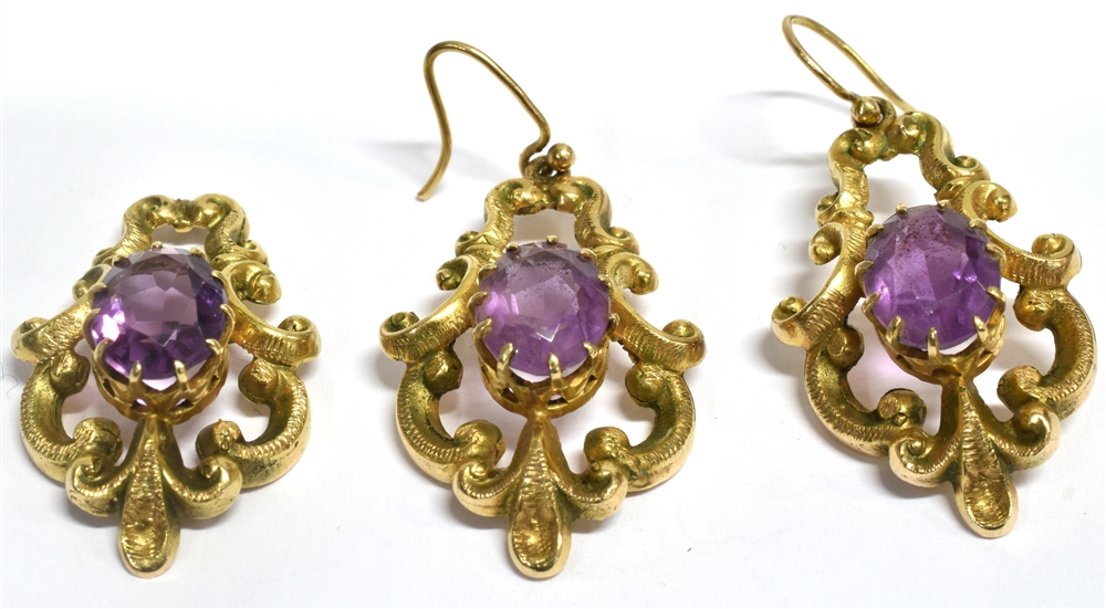 A PAIR OF AMETHYST SINGLE STONE SET DROP EARRING WITH MATCHING PENDANT the oval amethysts 10mm X 8mm