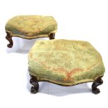 A PAIR OF 19TH CENTURY FOOTSTOOLS with tapestry tops and cabriole legs, each 15cm high, 34cm wide,