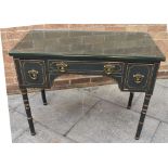 GREEN PAINTED DESK with gilt decoration to the sides, with a central long shallow drawer flanked