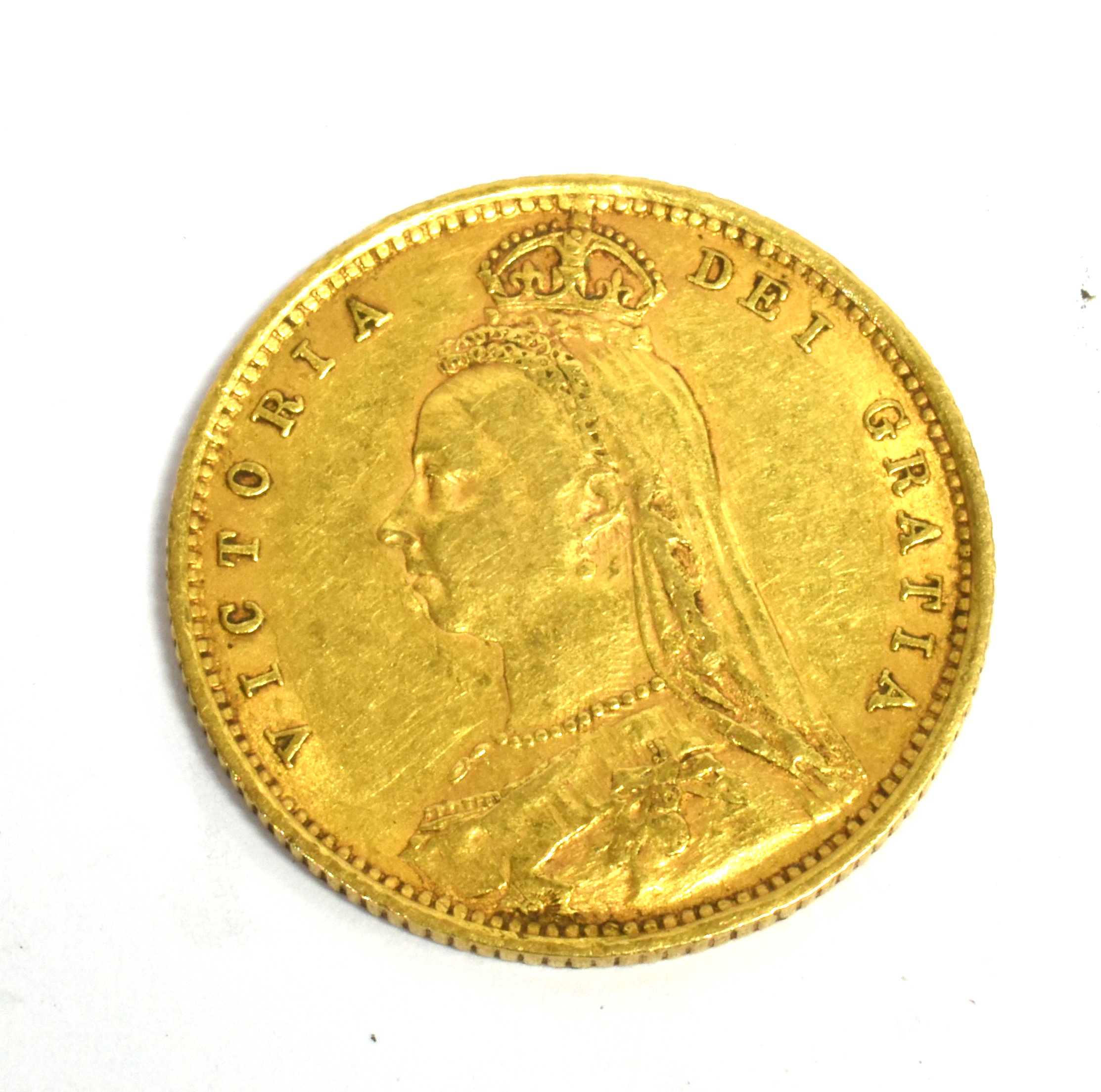 A VICTORIAN HALF SOVERIGN COIN the old head, bust and shield back half sovereign dated 1892