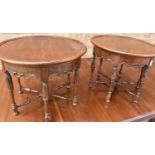 PAIR OF LOW CIRCULAR COFFEE TABLES raised on six turned legs each united by stretcher, 41cm high,