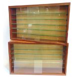 A PAIR OF MAHOGANY DISPLAY CABINETS each with five adjustable glass shelves and a pair of glass
