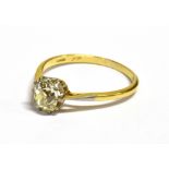 A DIAMOND SOLITARE 18CT GOLD RING The cushion shaped old cut diamond weighing approx. 0.75 carat