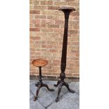 A MAHOGANY TRIPOD WINE TABLE with carved decoration, the top 26cm diameter, 62cm high; together with