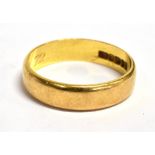 A HALLMARKED 22CT GOLD PLAIN WEDDING BAND 5 mm wide weighing approx 4.4 grams Condition Report :