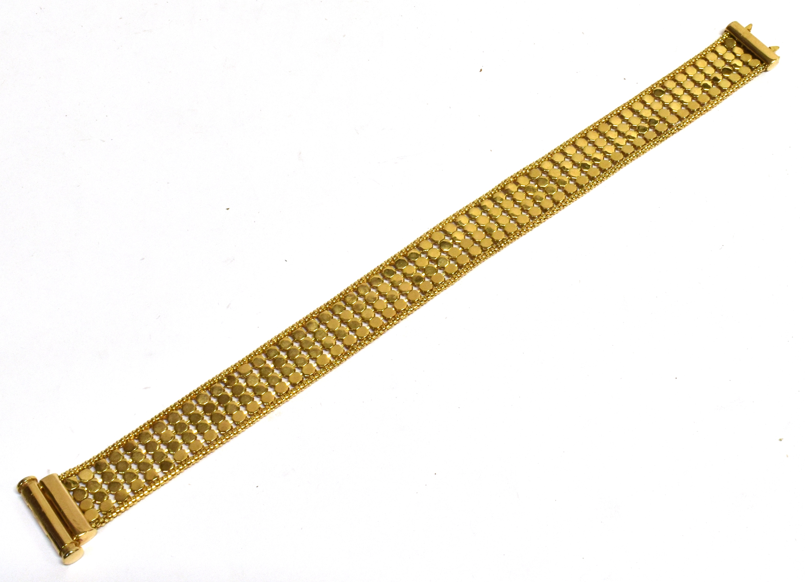 A 9CT GOLD FANCY LINK BRACELET the four row bracelet with octagonal shaped links to a tubular sprung - Image 2 of 3