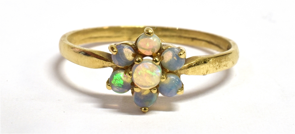 AN OPAL CLUSTER 9CT GOLD DRESS RING seven small opals to hallmarked 9ct gold shank, size P, gross