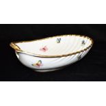 DAGOTY, PARIS: A PORCELAIN BOWL of fluted oval form, enamelled decoration of butterflies and