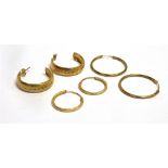 THREE PAIRS OF 9CT GOLD HOOP EARRINGS 30mm, 27mm and 20mm diameter Total weight of approx. 3.7 grams