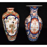 AN IMARI VASE OF BALUSTER FORM the reserves decorated with a geisha, blossoming tree and birds