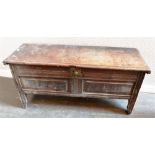 EARLY 18TH CENTURY OAK COFFER, the hinged moulded top opening to reveal a candle box, with two plain