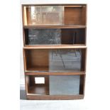 20th CENTURY SIMPLEX FOUR SECTION STACKABLE BOOKCASE, each section with glass sliding doors, with