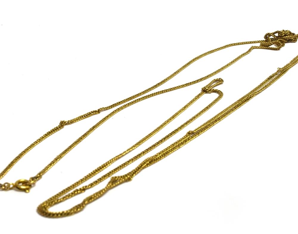 A 9CT GOLD LONG CHAIN the twisted curb link chain to a bolt ring fastener, fastener stamped '9',