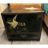 JAPANESE LACQUERED TABLE TOP CABINET, with twin cupboard doors opening to reveal a fitted shelf,