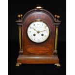 AN EDWARDIAN MAHOGANY CASED MANTEL CLOCK the enamel dial with Arabic numerals, inscribed 'Tempus