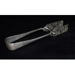 A PAIR OF SILVER ASPARAGUS TONGS The spring action tongs with floral scroll decorated grips,