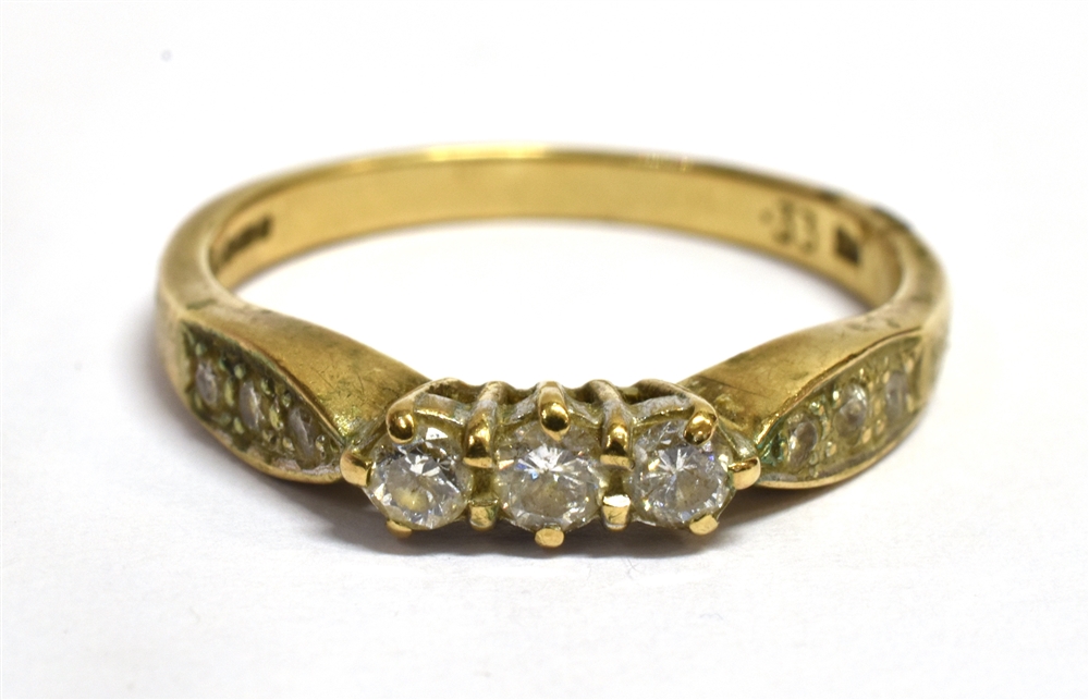 A DIAMOND THREE STONE 9CT GOLD RING with diamond set shoulders, stamped, total diamond weight of 0. - Image 4 of 4