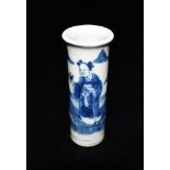 A SMALL CHINESE VASE of cylindrical form with flared rim, underglaze blue painted decoration of a