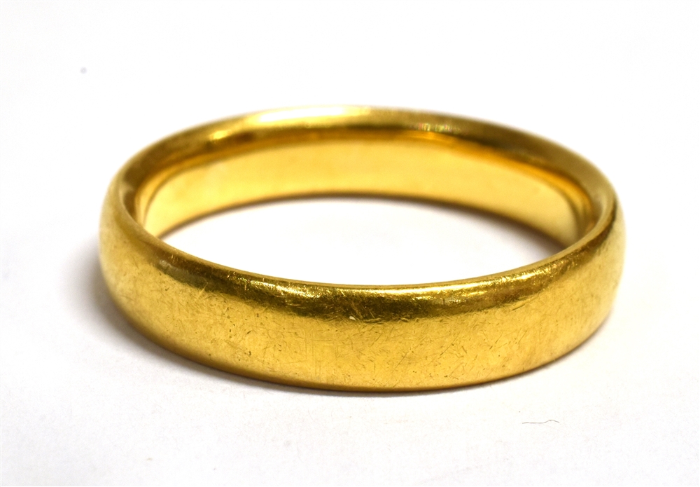 A 22CT GOLD HALLMARKED PLAIN WEDDING BAND of D profile, 4mm wide, weighing approx. 4.8grams, ring