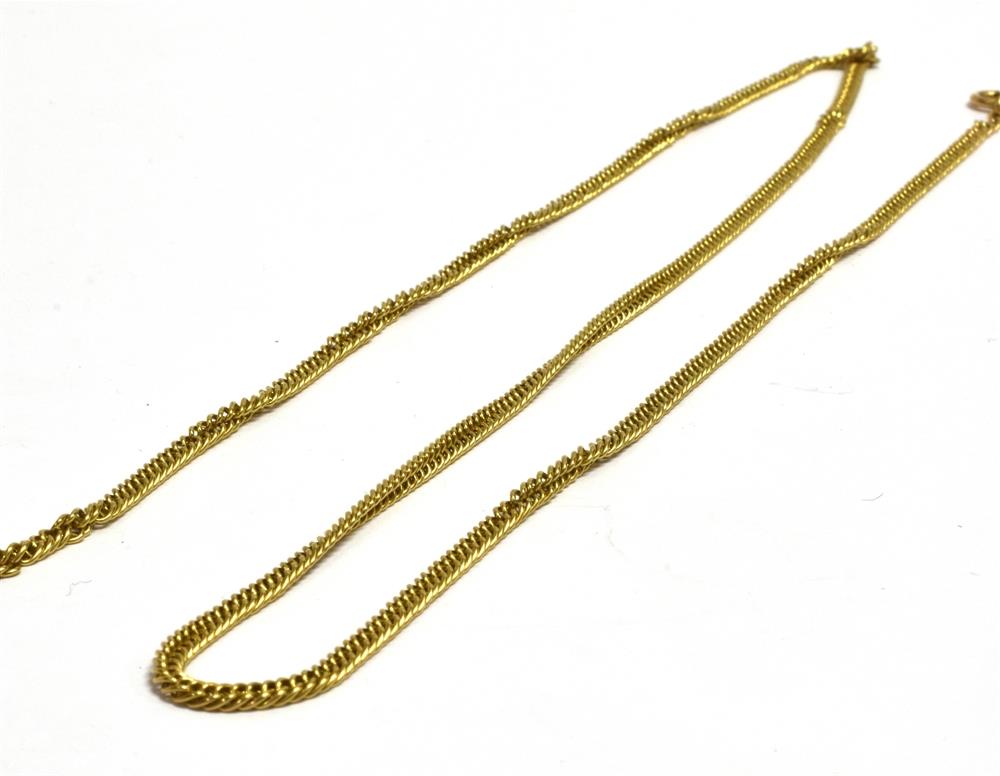 A 9CT GOLD LONG CHAIN the twisted curb link chain to a bolt ring fastener, 24 inches long,