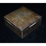 A SMALL SILVER CIGARETTE BOX The square plain box cedar lined with weighted base 9cms square