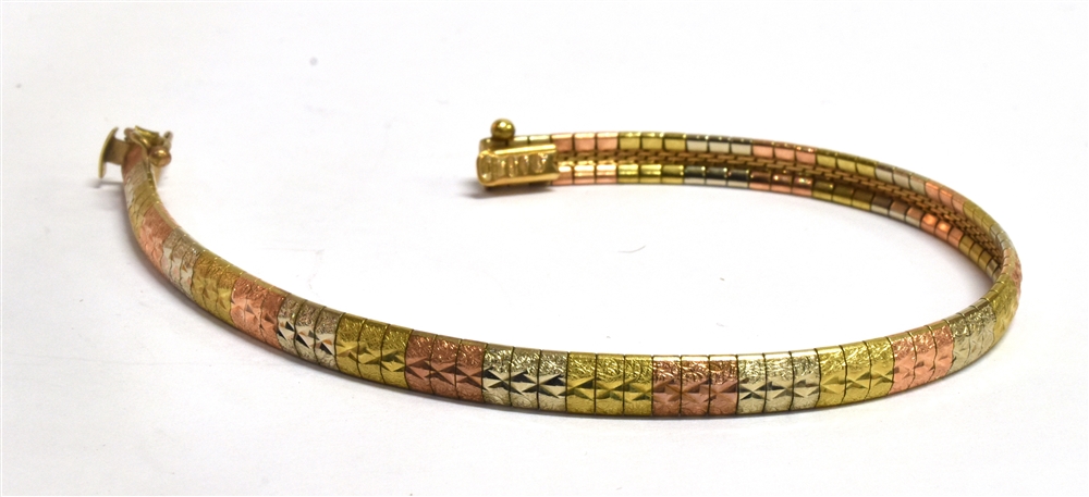 A 9CT THREE COLOUR GOLD BRACELET the alternating sections of yellow, white and rose gold to snap