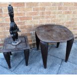 TWO TRIBAL WOODEN TABLES, possibly West African, the largest, 57cm x 50cm x 58cm, with a plain