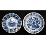 AN 18TH CENTURY DUTCH DELFT 'PEACOCK' PLATE 26.5cm diameter, and another similar (2) Condition